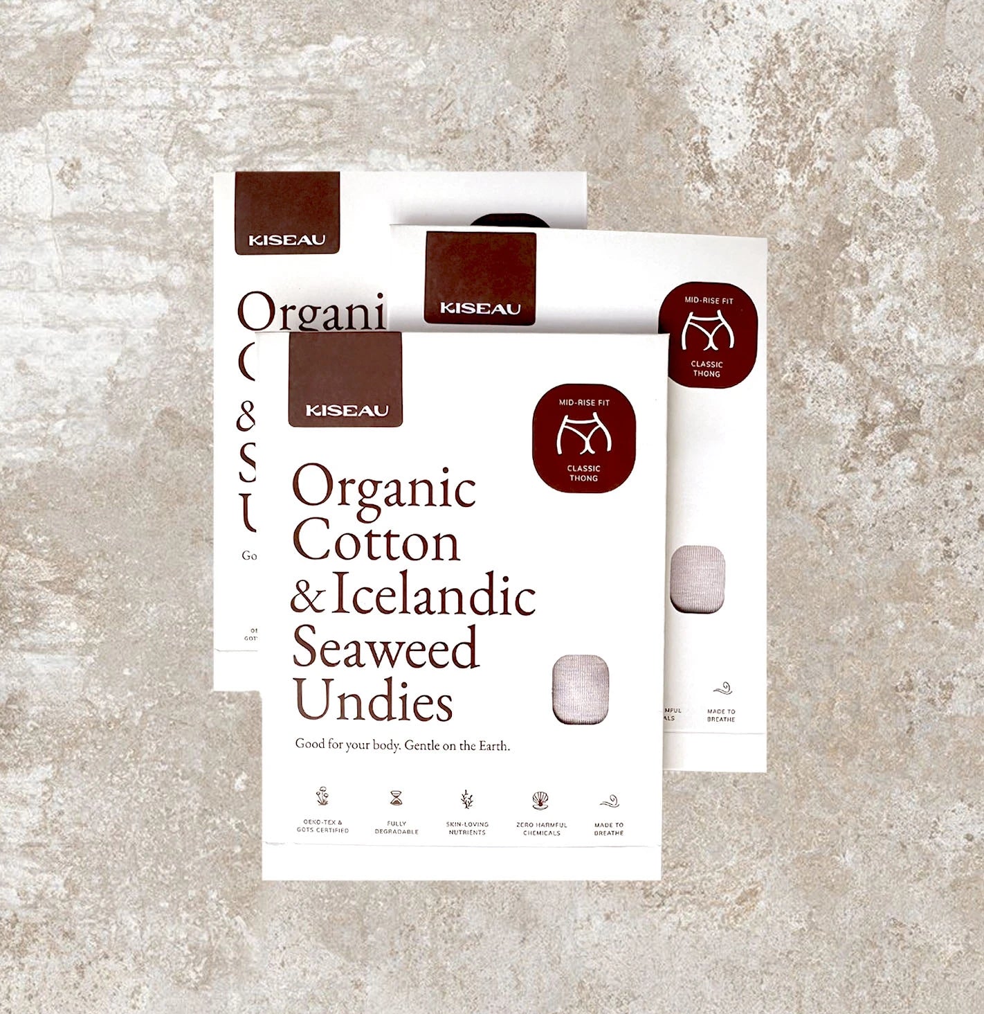 Three Kiseau Organic Cotton & Icelandic Seaweed underwear boxes neatly arranged, highlighting sustainable minimal packaging design.
