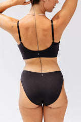 Kiseau Charcoal Cheeky Bikini and Bralette back view with Kiseau logo tags — seaweed organic cotton underwear