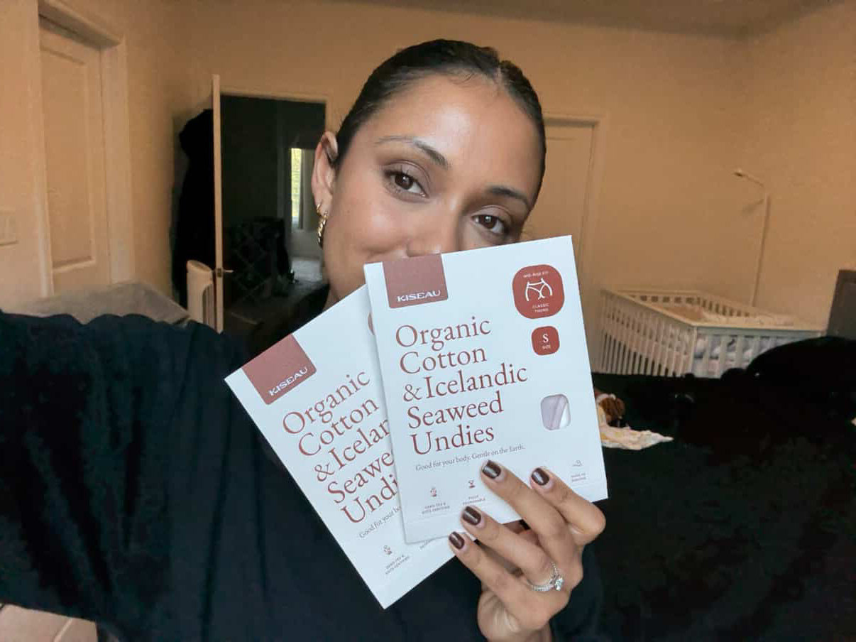 Customer holding two boxes of Kiseau Organic Cotton & Icelandic Seaweed Undies, expressing excitement for natural, toxin-free underwear.