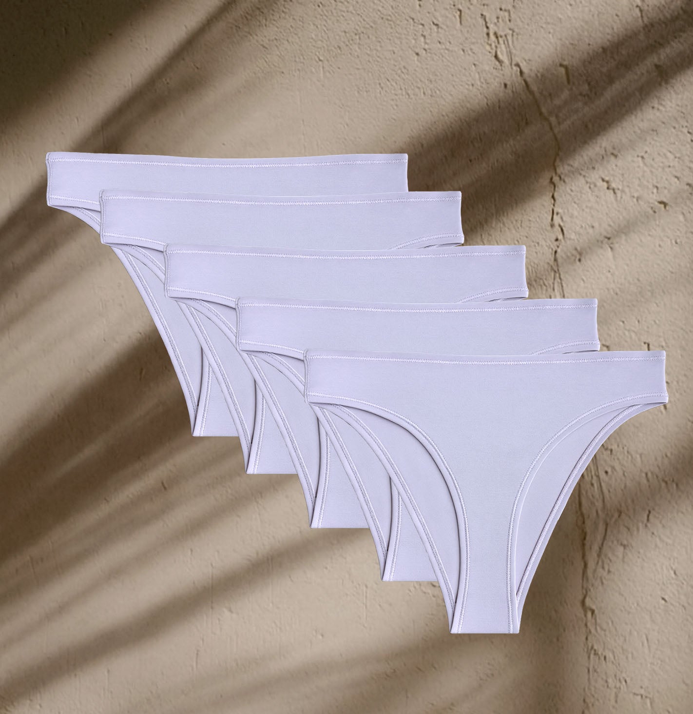 Five pairs of Kiseau Organic Cotton Brazilian Underwear, soft breathable design, made from eco-friendly natural materials.