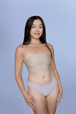 Woman wearing Kiseau organic cotton Brazilian underwear for women, eco-friendly breathable design, front view.