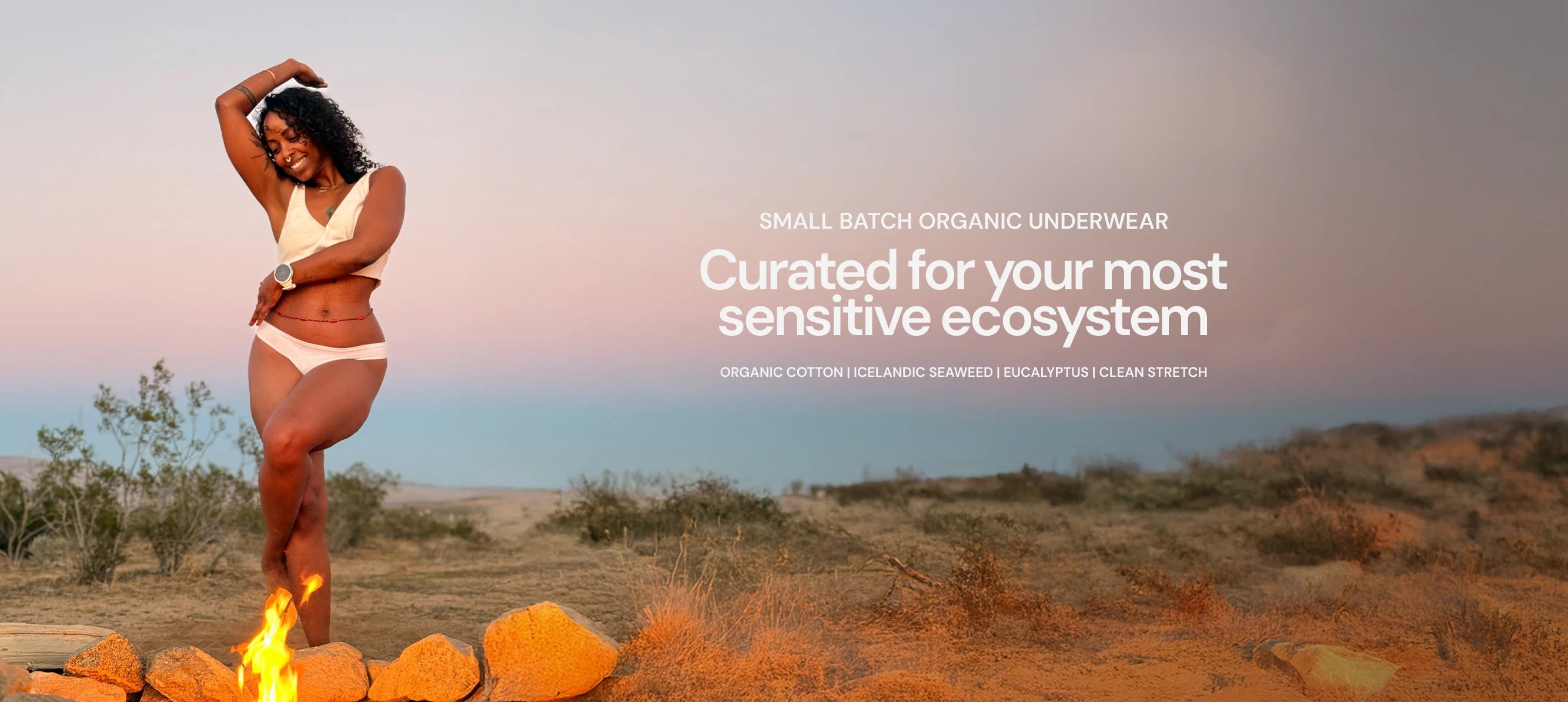 Woman wearing Kiseau small-batch organic underwear outdoors at sunset, highlighting natural fabrics designed for the body’s most sensitive skin.
