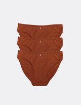 Three Kiseau Cheeky Bikinis in Terra Cotta, back view, organic cotton